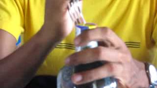 Como Abrir Una Botella de Aguardiente [upl. by Ahsimit]