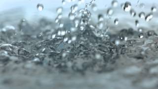 Rainfall Slow Motion HD Heavy Rain Drops Falling in Slow Mo Video View of Droplets Hitting Water [upl. by Anaele]