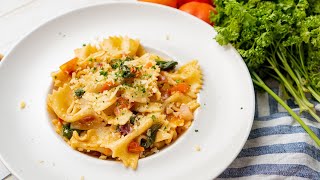 Easy BOW TIE PASTA WITH SPINACH AND TOMATOES Recipe  Recipesnet [upl. by Debora]