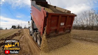 This one is BAD Fixing this 850 foot gravel driveway with the Cat 299 Skid Loader and power rake [upl. by Guod403]