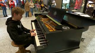 Playing famous songs on piano in public [upl. by Sy]