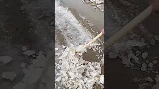 Cleaning process of manganese steel shovel on frozen road surface [upl. by Enoitna]