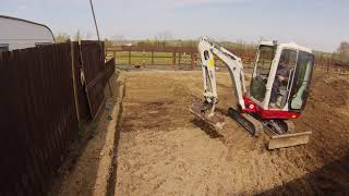 Digging out a base for a stable with a Takeuchi TB216 Digger Excavator [upl. by Anyel]