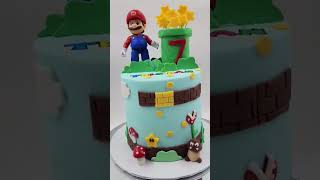 Step into a world of sweet nostalgia with our sculpted Mario cake by Candyland Designs [upl. by Geilich]