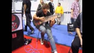 Scott Fernandez playing 12 string bass headless with fan frets Prat Basses NAMM 2011 [upl. by Elmore]