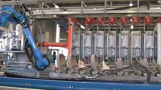 Motoman robot handling moulded clay wash basins [upl. by Ysor650]