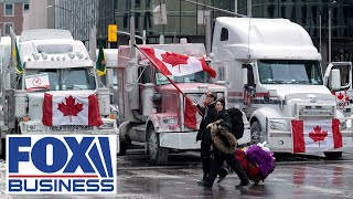 Canadian truckers hold the line despite Trudeau invoking emergency powers [upl. by Cerellia]