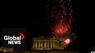 New Years 2024 Athens Acropolis illuminated by colourful fireworks display [upl. by Ramled]