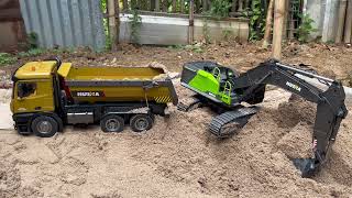 Exavator Huina 1593 VS Dump Truck Huina 1573 [upl. by Nnalatsyrc314]