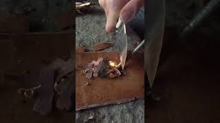 Making sparks with a fire steel and blade bushcraft bushcraftkit fire wildcamping firesteel [upl. by Bolt433]