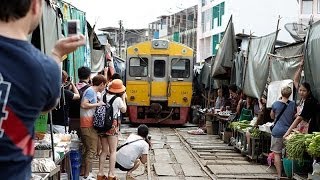 Maeklong Railway Market  Bangkok Thailand [upl. by Gaudette]