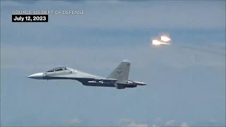 Chinese Fighter Jet Drops Series of Flares 900 Feet From US Plane [upl. by Saxon]