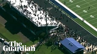 Aerial video shows evacuated students in football field after school shooting in Georgia [upl. by Ycnej]