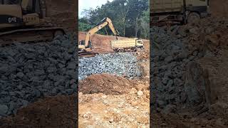 Excavator loading dump truck shotrs [upl. by Stark]