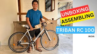 CYCLING Unboxing and assembling Decathlon TRIBAN RC100 road bike 2024 [upl. by Matias771]