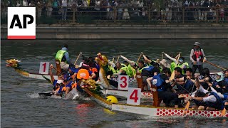 Fierce competition as annual dragon boat racing festivals held in Beijing and Hong Kong [upl. by Niwroc]