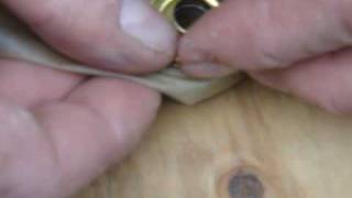 How to Insert a Grommet into Some Cloth [upl. by Oster]