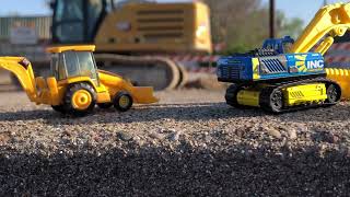 Construction toys  Hot wheels Matchbox and NORSCOT CAT 966G Wheel Loader at construction site￼ [upl. by Lrad]