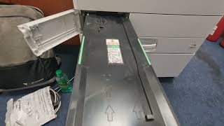 How to Clean the Toner Waste Container on Ricoh M C2000 Printer [upl. by Seira977]