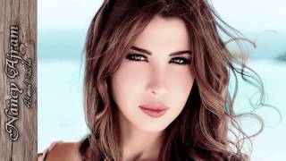 Nancy Ajram  A3mel 3a2la  EN Lyrics [upl. by Leksehc]