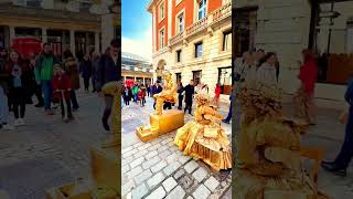 How the Goldman Living Statue works with the Gold Lady to entertain the public levitating art [upl. by Nnaecyoj210]