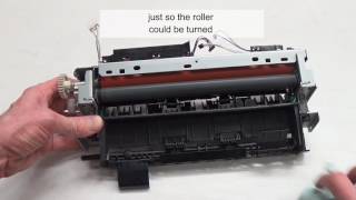 How to clean a printer fuser roller [upl. by Malinin]