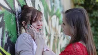 stock footage sad woman crying while hugging a friend color [upl. by Adnawaj]