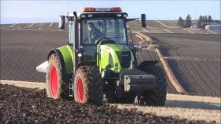 Claas Arion 640 tractor with Ovlac 5 furrow reversible plough  Grampian Supermatch [upl. by Leribag563]