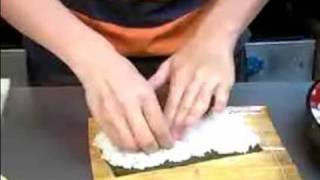 How to Make A California Sushi Roll  Adding Rice to Seaweed Sushi Wrap [upl. by Hodosh]