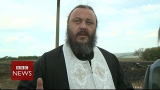 MH17 Were not terrorists says local priest in eastern Ukraine  BBC News [upl. by Ilehs96]