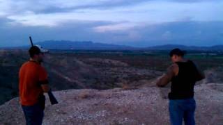 Shooting clay pigeons with mossberg 12 gauge [upl. by Cacia129]