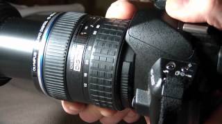 Faulty Olympus Zuiko 1260mm SWD lens with clicking zoom ring [upl. by Witcher]