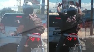 Vídeo Motociclista conduce feliz y bailando en medio de un congestionamiento [upl. by Teiluj81]