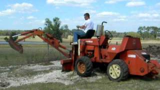 DitchWitch using backhoe [upl. by Enirbas]