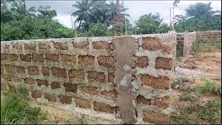 A view of an unfinished guesthouse house project being conducted by Iroko Timber and Logging Company [upl. by Darlene]