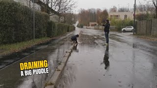 007 1 Unclogging a storm drain after heavy rain in Germany [upl. by Eshelman]