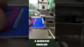 Sewing the Edge of an Emblem with a Merrow Machine [upl. by Adnolehs211]