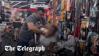 Peckham shop owner seen choking woman accused of stealing [upl. by Christiano]