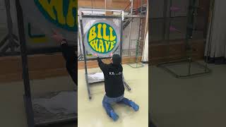 Man is tufting a custom rug with the logo for Bill Wave [upl. by Alyss]