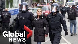 Coronavirus outbreak Police confront COVID19 lockdown protesters in Berlin [upl. by Ennahgiel]